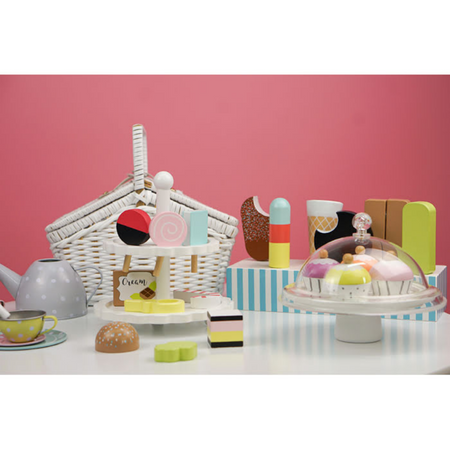 toy picnic set with cake plate and toy cupcakes